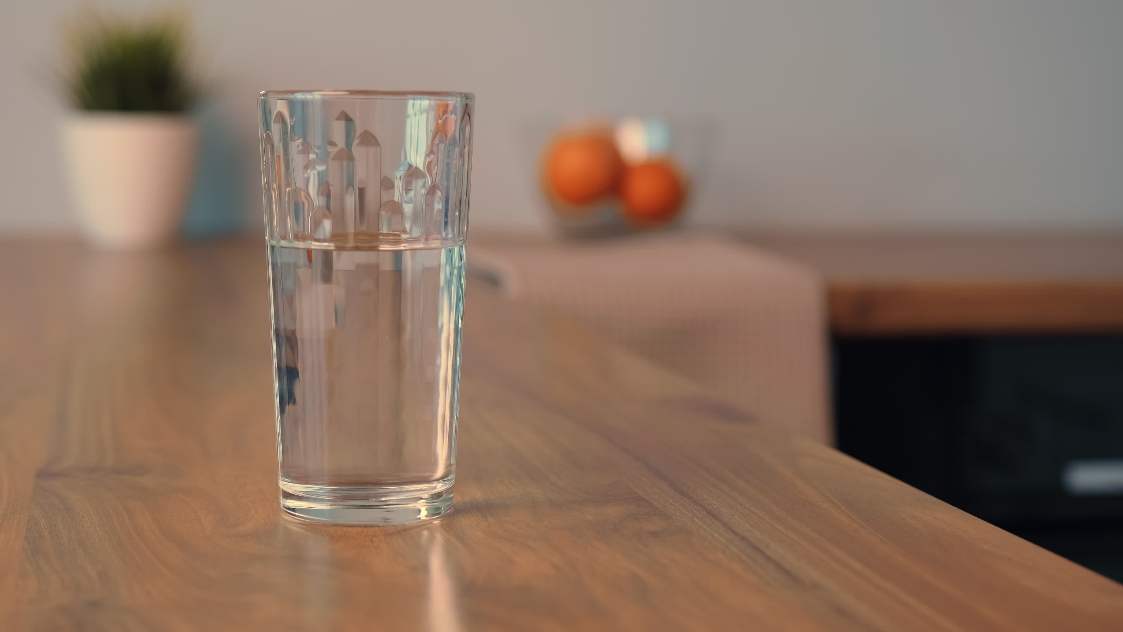 Clear glass of water on a calm morning table setting with natural light